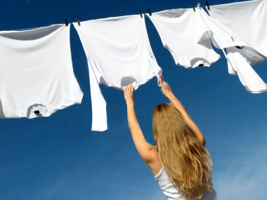 girl hanging laundry